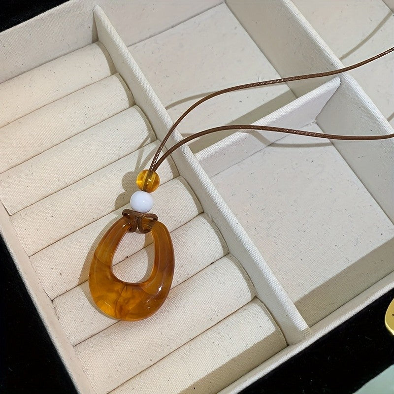 Amber Resin Hollow Oval Necklace