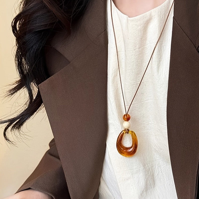Amber Resin Hollow Oval Necklace