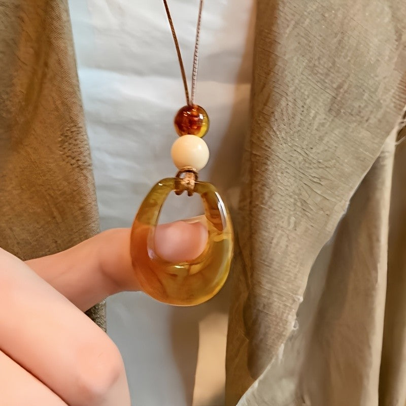Amber Resin Hollow Oval Necklace