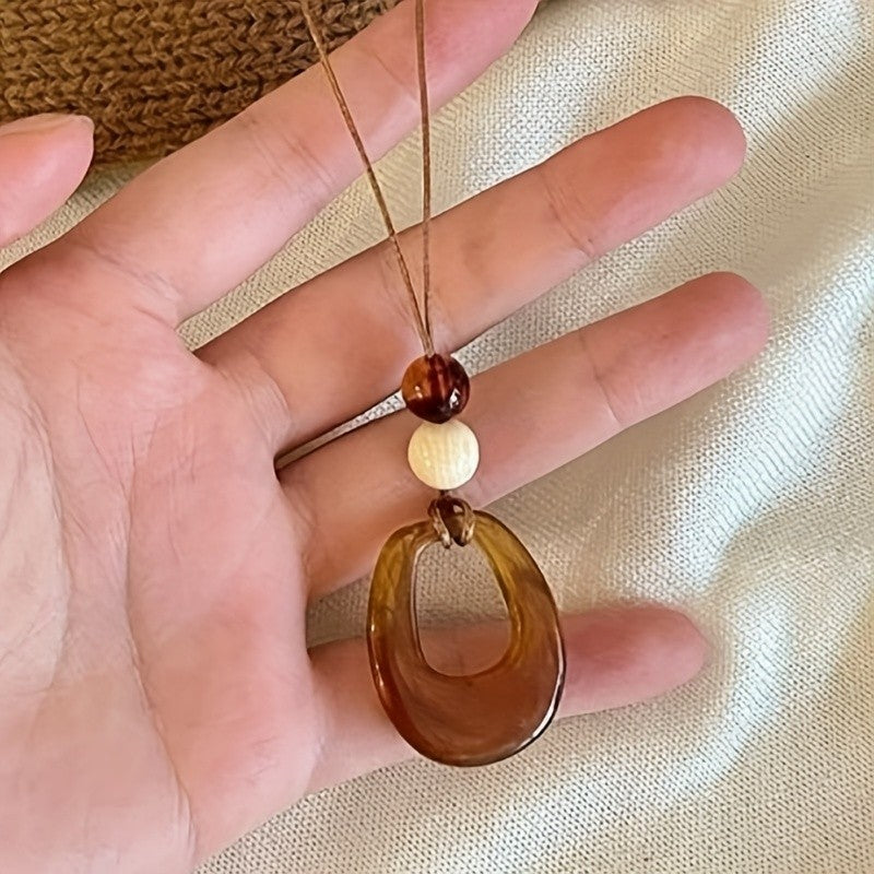 Amber Resin Hollow Oval Necklace