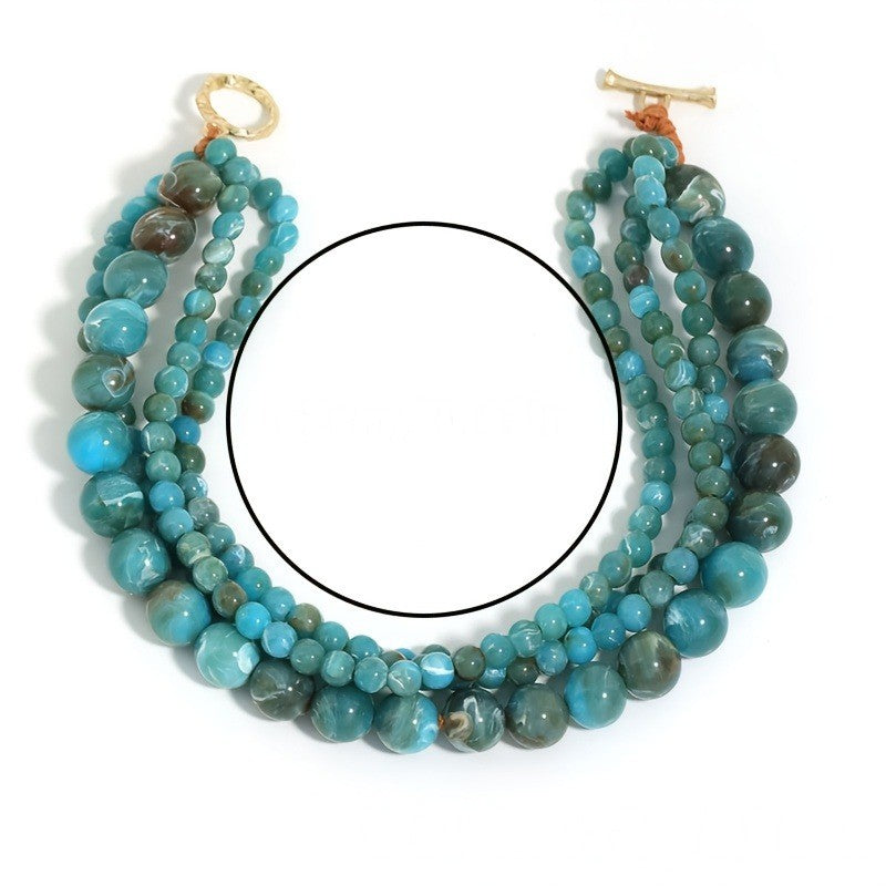Blue Beaded Hammered Pendant Necklace