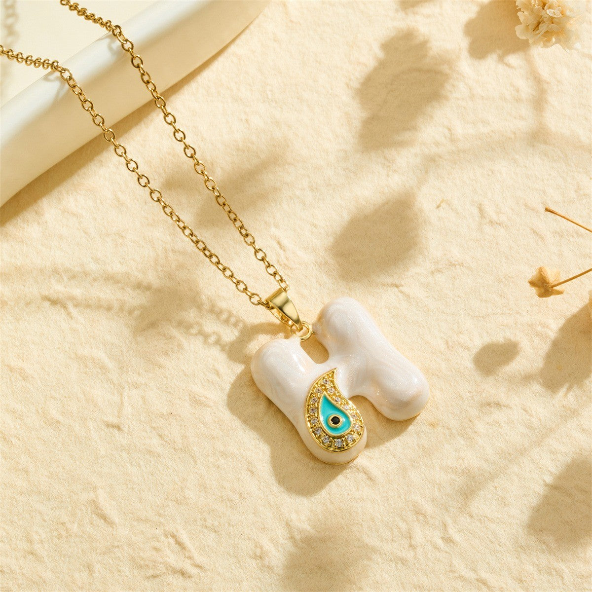 White Bubble Letter Evil Eye Necklace