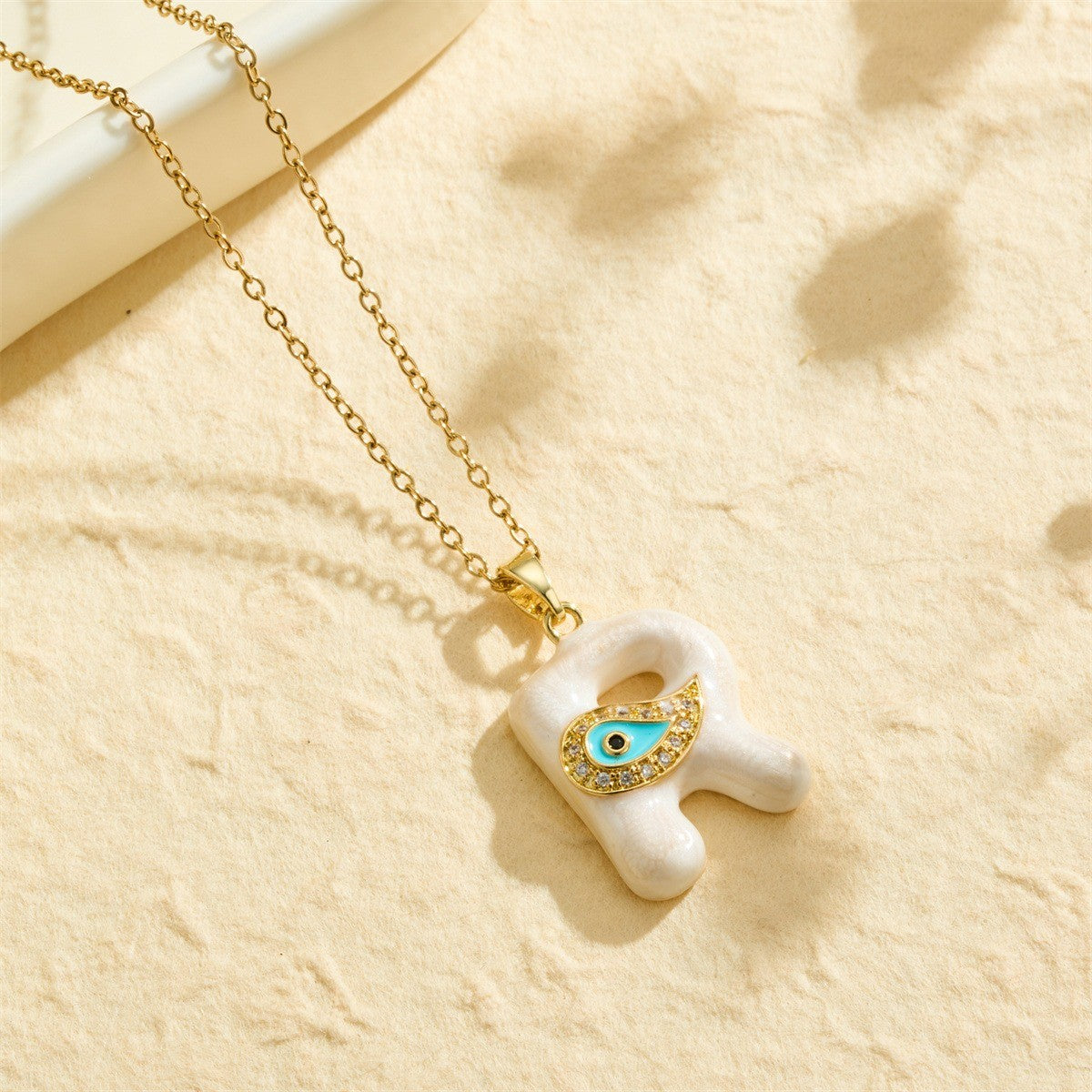 White Bubble Letter Evil Eye Necklace