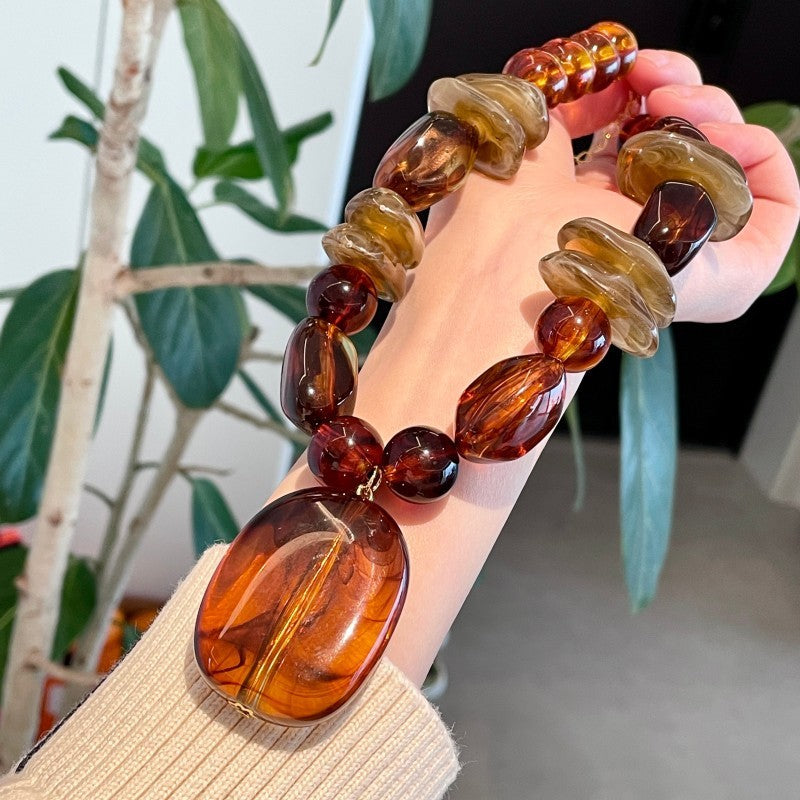 Amber Tonal Oval Pendant Necklace