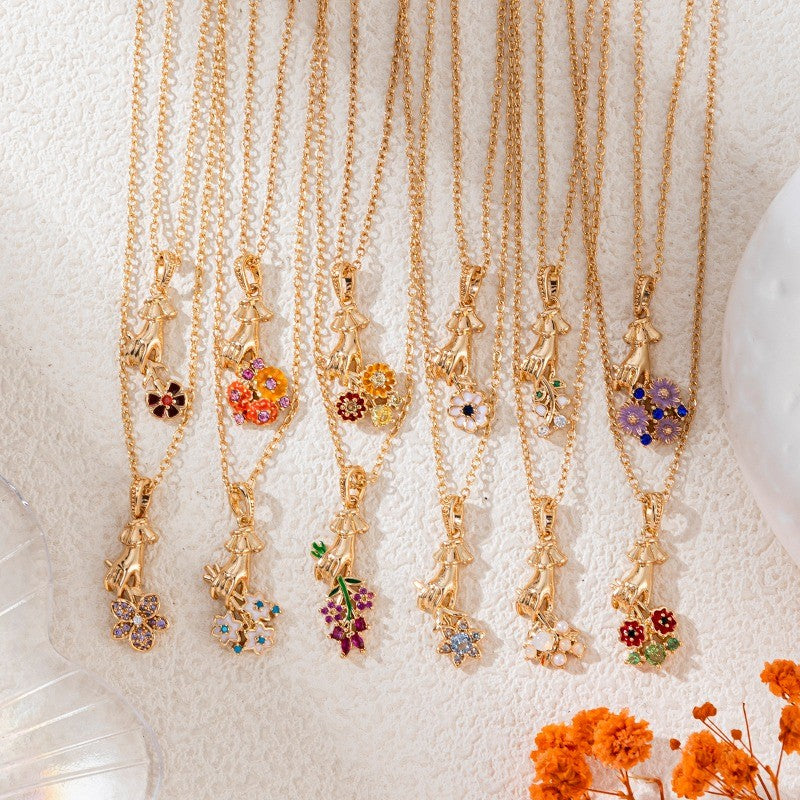 Hand Holding Flower Necklace