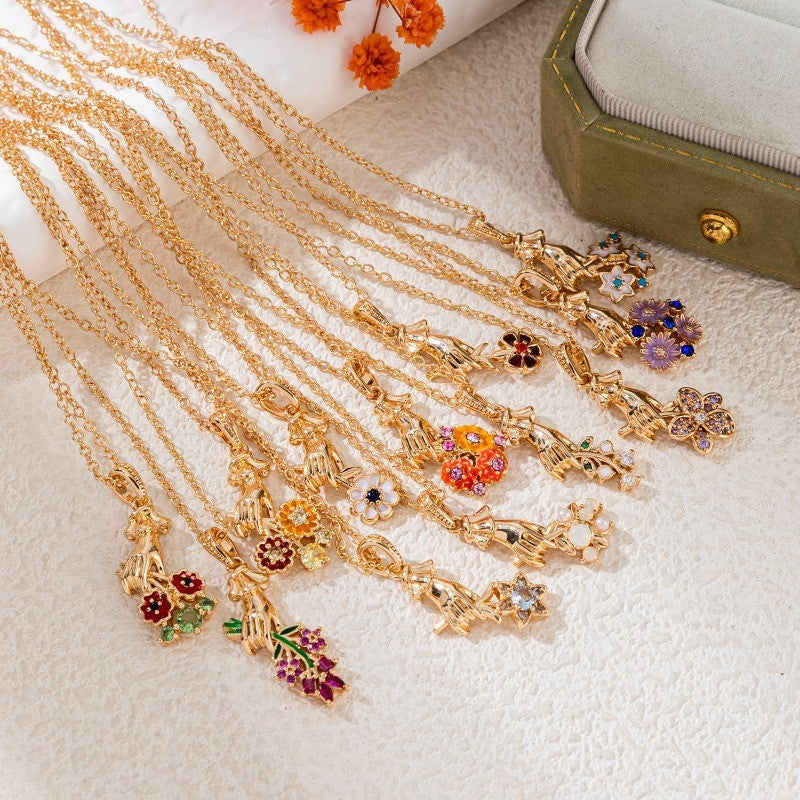 Hand Holding Flower Necklace