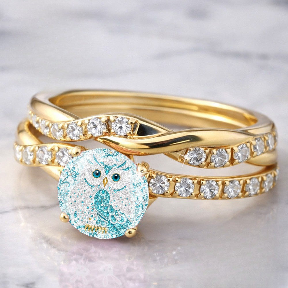 Blue Owl & Crystal Twist Ring