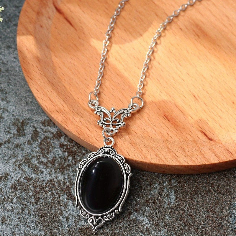 Black Oval Scroll Pendant Necklace
