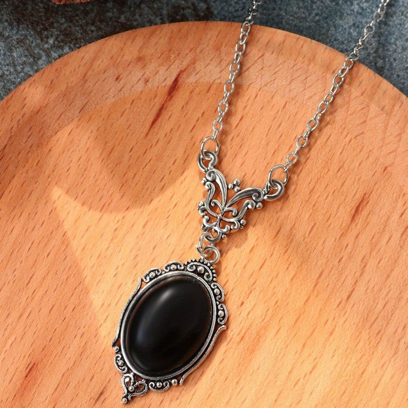 Black Oval Scroll Pendant Necklace