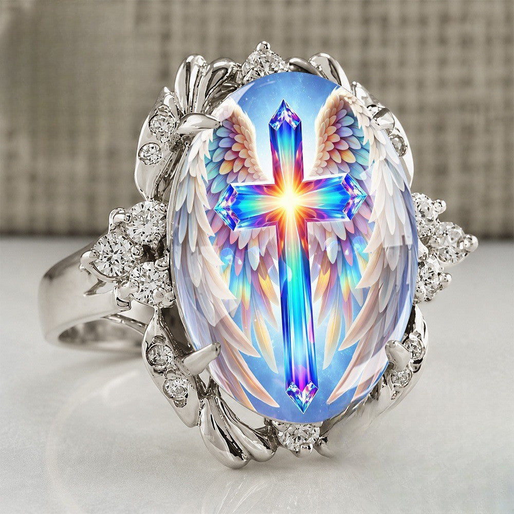 Radiant Cross & Wing Ring
