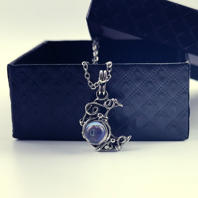 Wire Wrapped Moonstone Bird Necklace