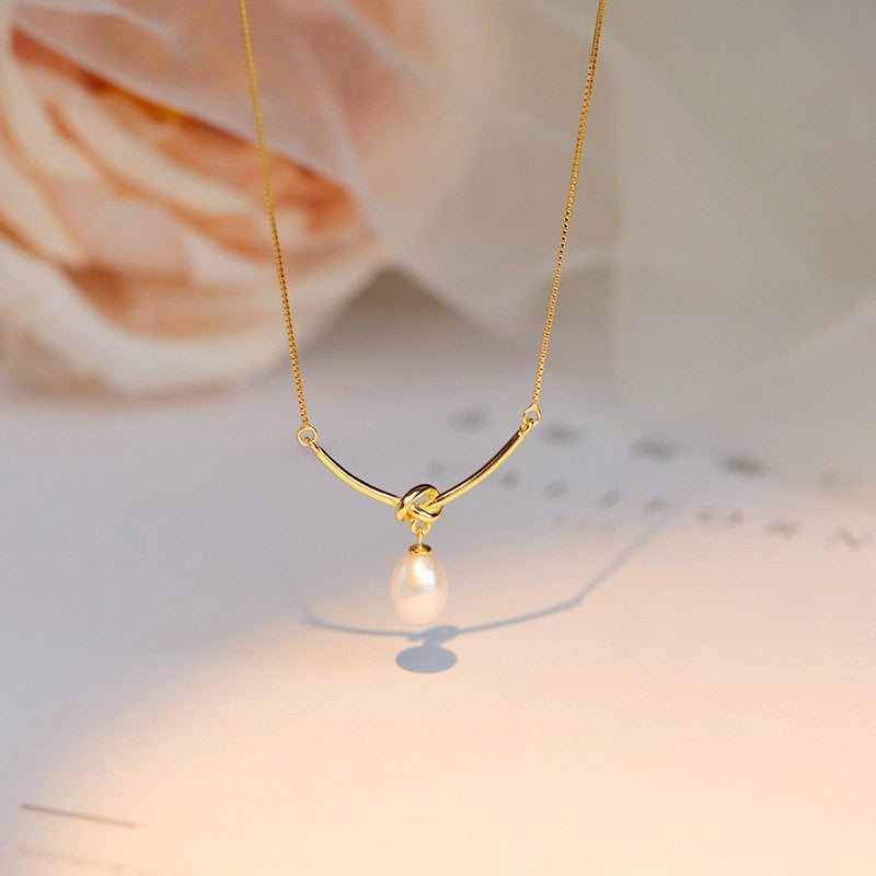 Curved Bar Knot Pearl Necklace