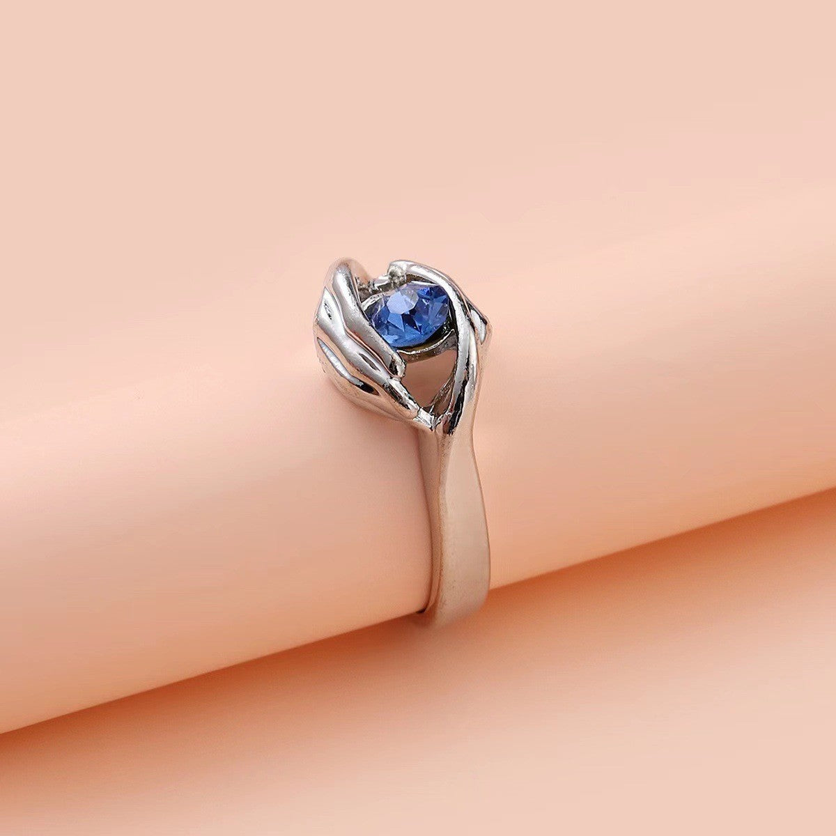 Cupped Hands Blue Stone Ring