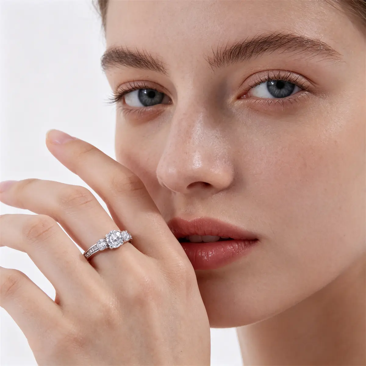 Elevated Three Stone Ring